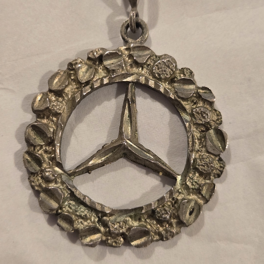 vintage Mercedes-Benz emblem pendant. Sterling Silver. Marked SS. Hammered Metal
